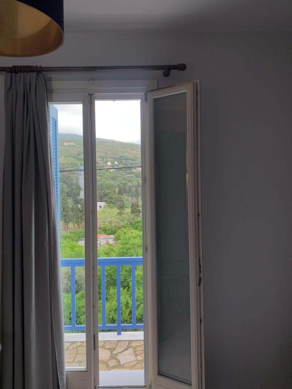 Andros Guesthouses Exterior photo