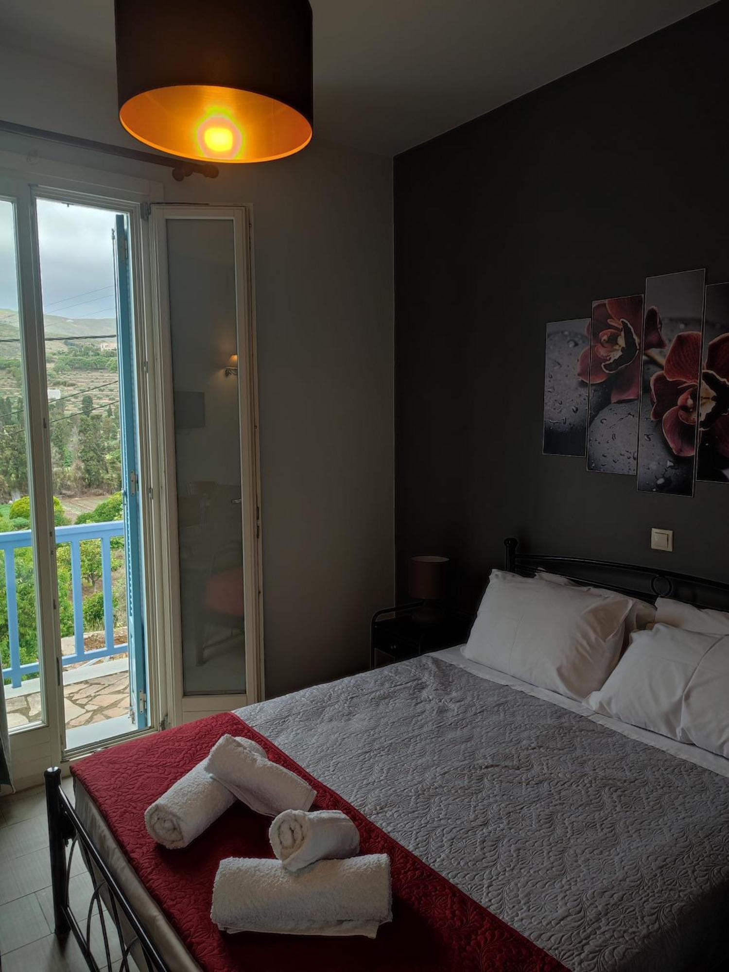 Andros Guesthouses Exterior photo